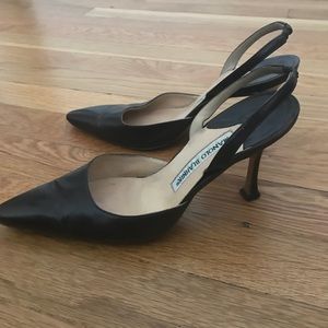 Manolo Blahnik sling backs.